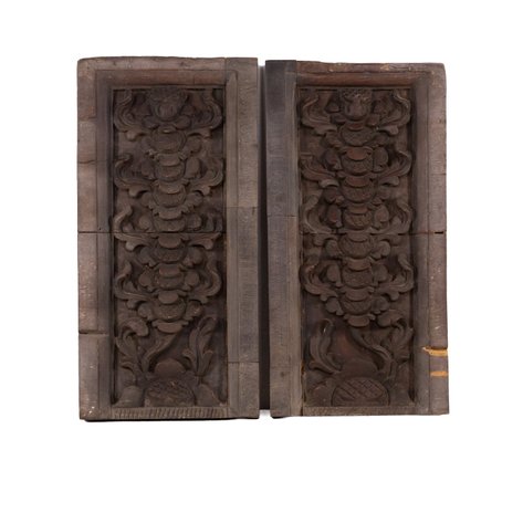 A pair of church retablo (altar) front panels featuring sunflowers symbolizing Mary’s lively faith