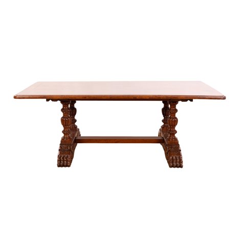 A fine 8-seater Renaissance Revival refectory table with Chinese guardian lion mask and paw feet trestle base
