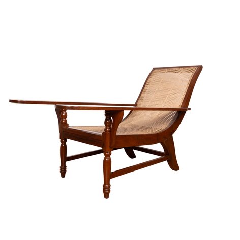 A butaca (lounging chair) featuring a square crest and elongated paddle armrests