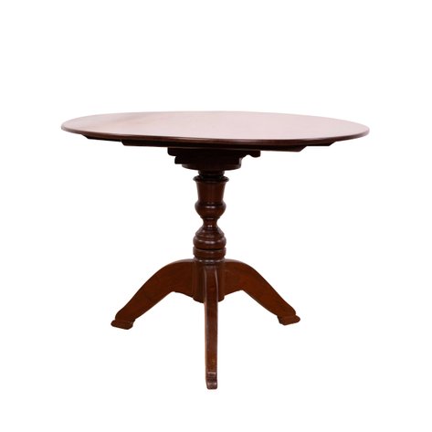 A masterfully executed round tilt-top table featuring a rare four-batten structural support system