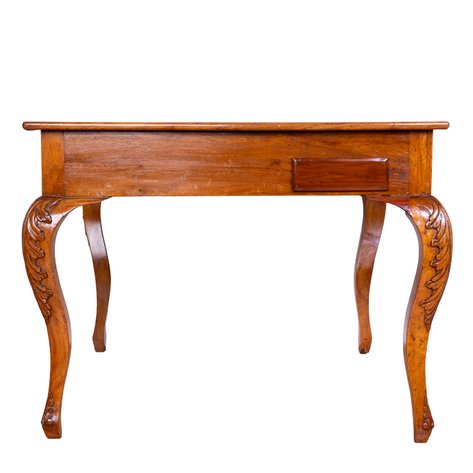 A four-drawer gaming table with pull-out drawers and carved acanthus cabriole legs