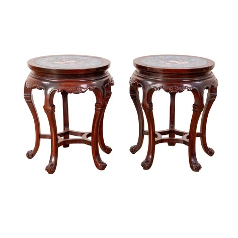 A pair of round accent tables featuring inset cloisonné enamel tops