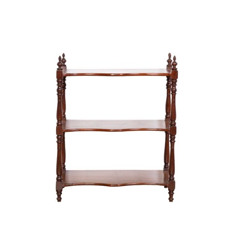 A three-tier whatnot with serpentine shelves