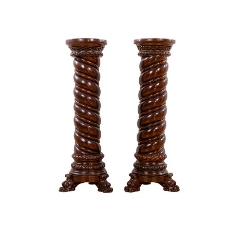 A pair of jardinière stands with exceptional Solomonic twisted columns on robust lion claw feet