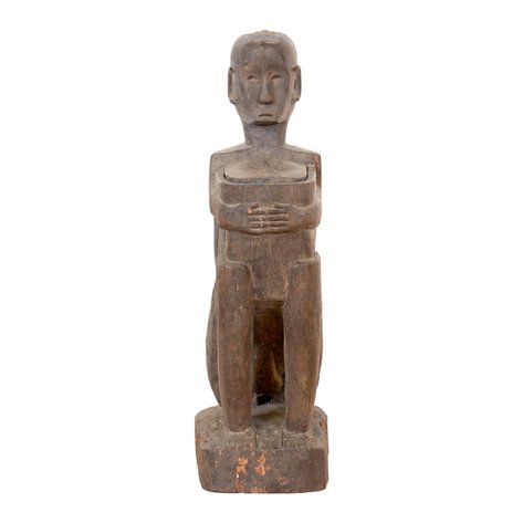 A seated figure holding an offering box, possibly from Mayaoyao area