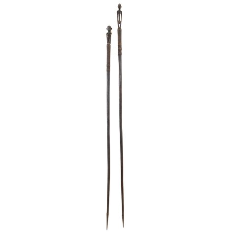 A lot of 2 Ifugao walking sticks