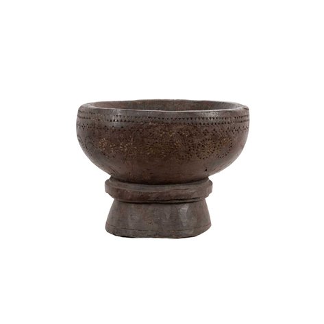 A large Maranao lesong (spice mortar) featuring geometric okir-a-bai motifs