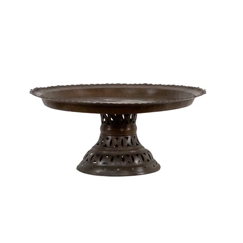 A round brass serving tray