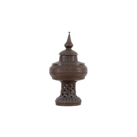 A medium-sized brass gadur