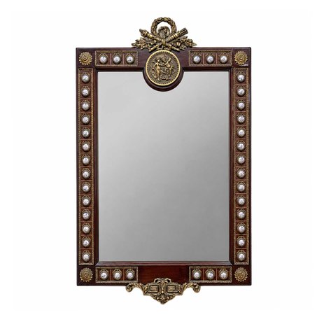 A grand French Empire Revival mirror frame bordered by ormolu-mounted laurel wreaths, porcelain plaques, and carved upright leaf moldings