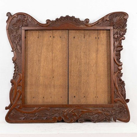 An Estilo Tampinco Art Nouveau frame featuring anahaw leaf motif and trailing flora
