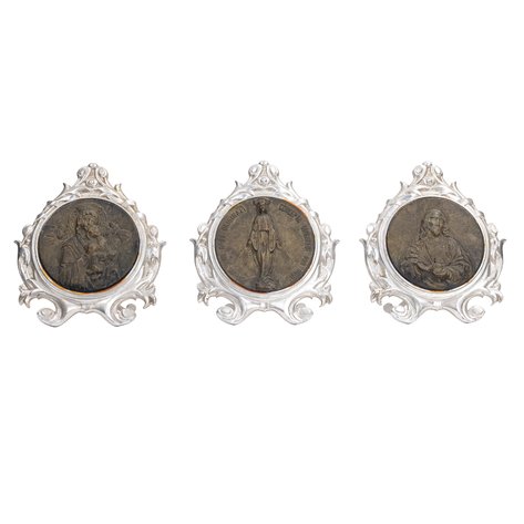 A trio of Rococo style miniature altars depicting Our Lady of Perpetual Help, the Miraculous Medal, and the Sacred Heart of Jesus