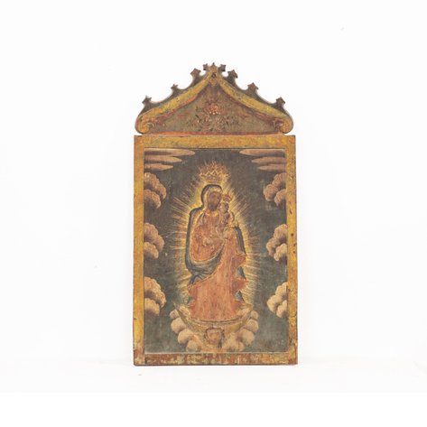 An icon of the Nuestra Señora de los Remedios in a Gothic frame