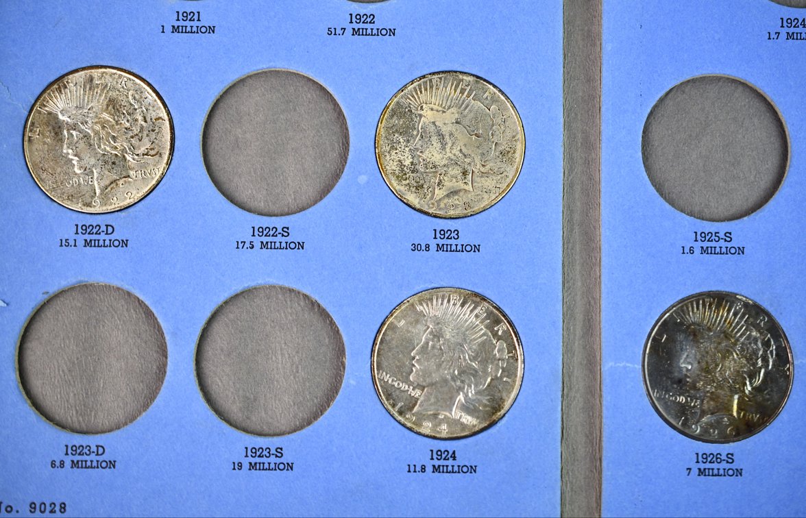 United States Peace Silver Dollars in Date Book, photo 2 of 8