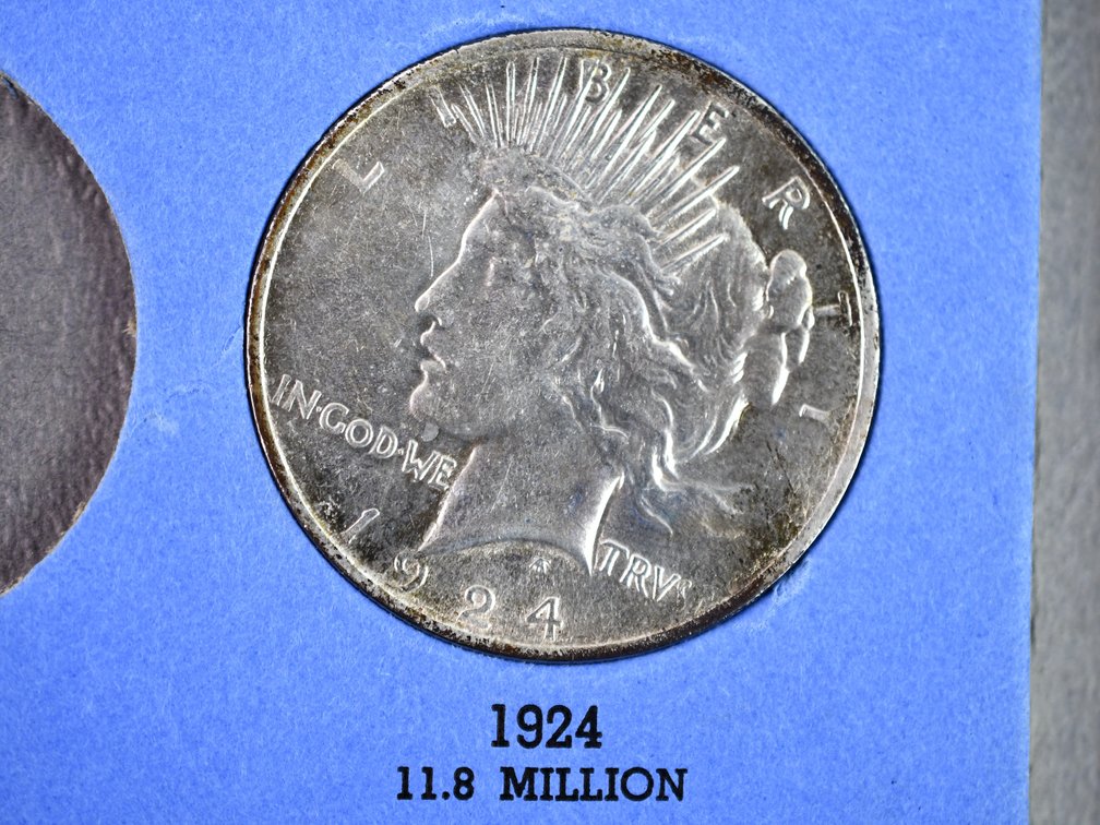 United States Peace Silver Dollars in Date Book, photo 7 of 8