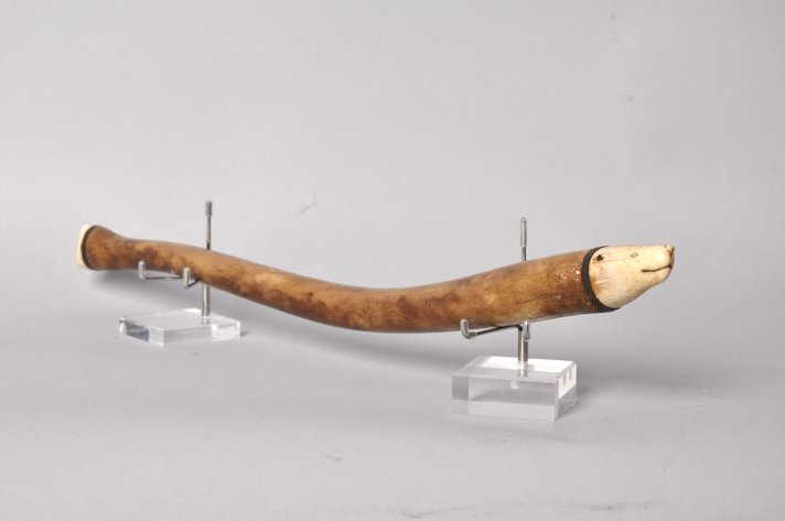 Inuit Walrus Bone Oosik Club with a Bear Figure