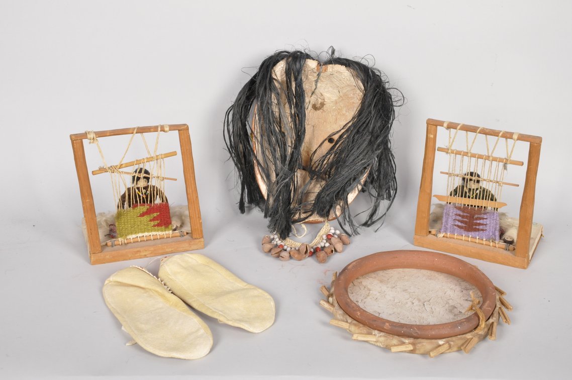 Moccasins, Clay Frame Drum, Weavers, and Mask, photo 9 of 10