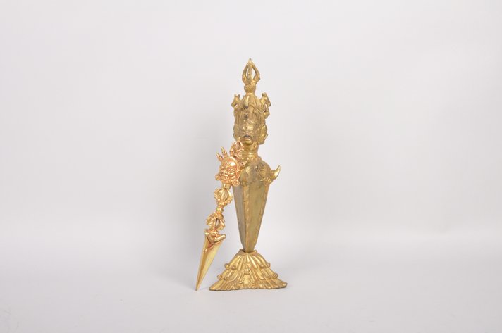 Two Tibetan Gold Toned Bronze Vajra Pestle's