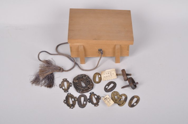 Japanese Tsuba, Seppa Spacers, Fuchi with Retaining Clip, and Wooden Box