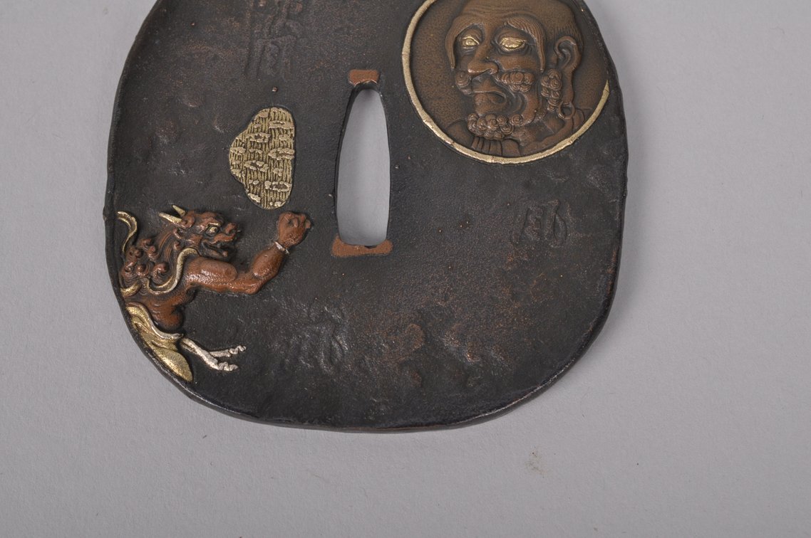 Tsuba with an Oni Kneeling before Abe no Seimei, photo 5 of 9