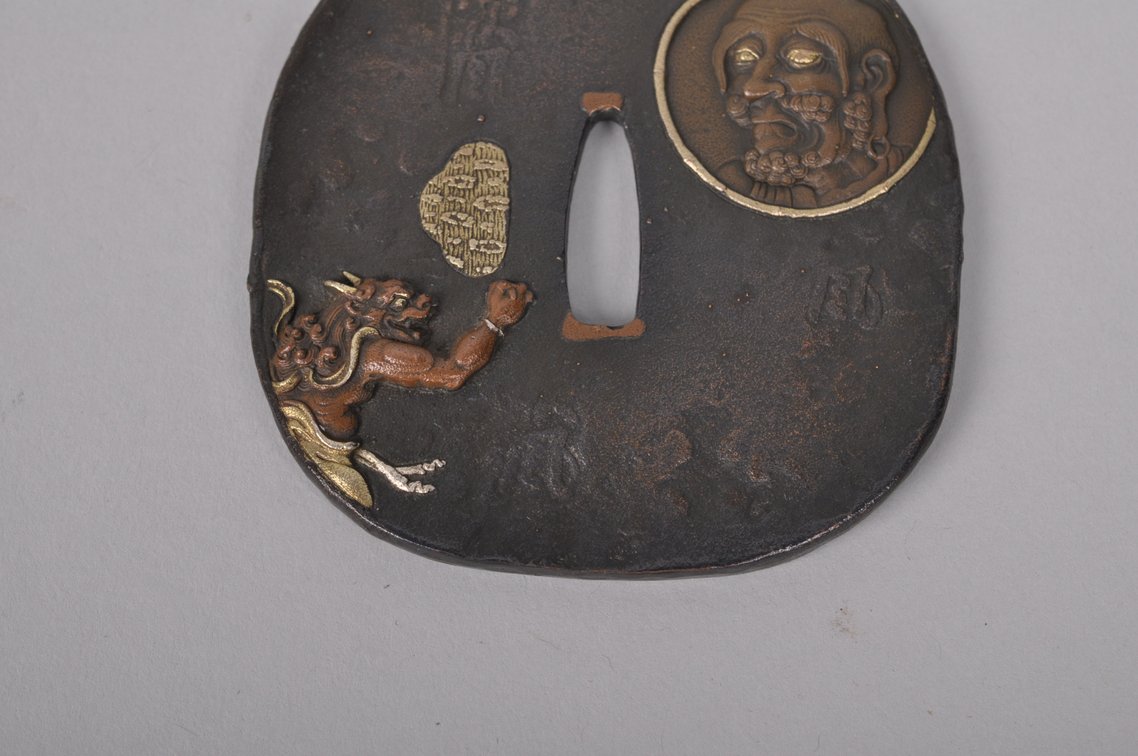 Tsuba with an Oni Kneeling before Abe no Seimei, photo 3 of 9