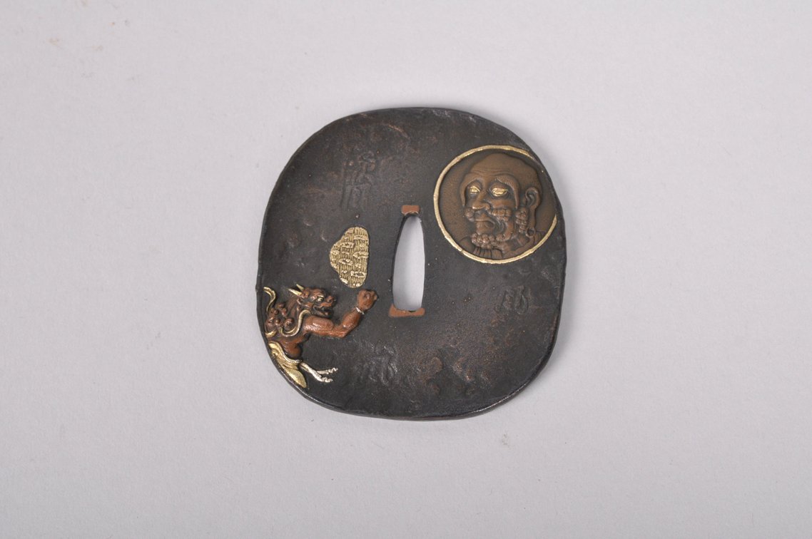Tsuba with an Oni Kneeling before Abe no Seimei, photo 2 of 9