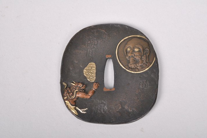 Tsuba with an Oni Kneeling before Abe no Seimei