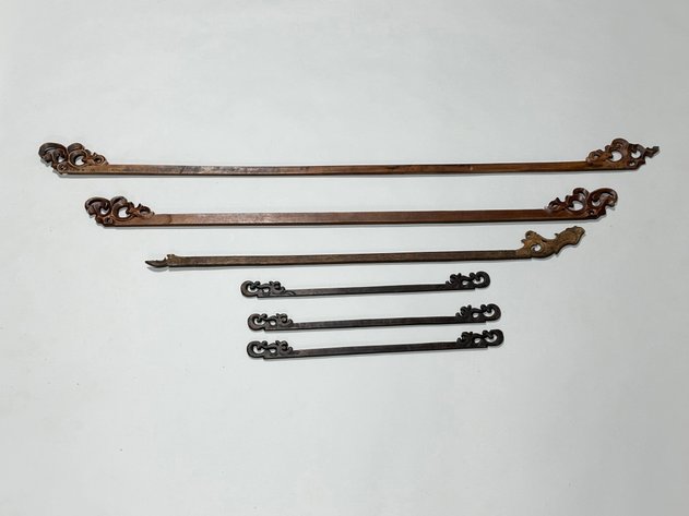 Six Carved Wooden Scroll Textile Hangers