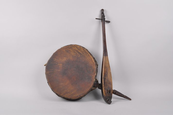 Indonesian Wooden Batak Kulcapi lute and a Nepal Drum
