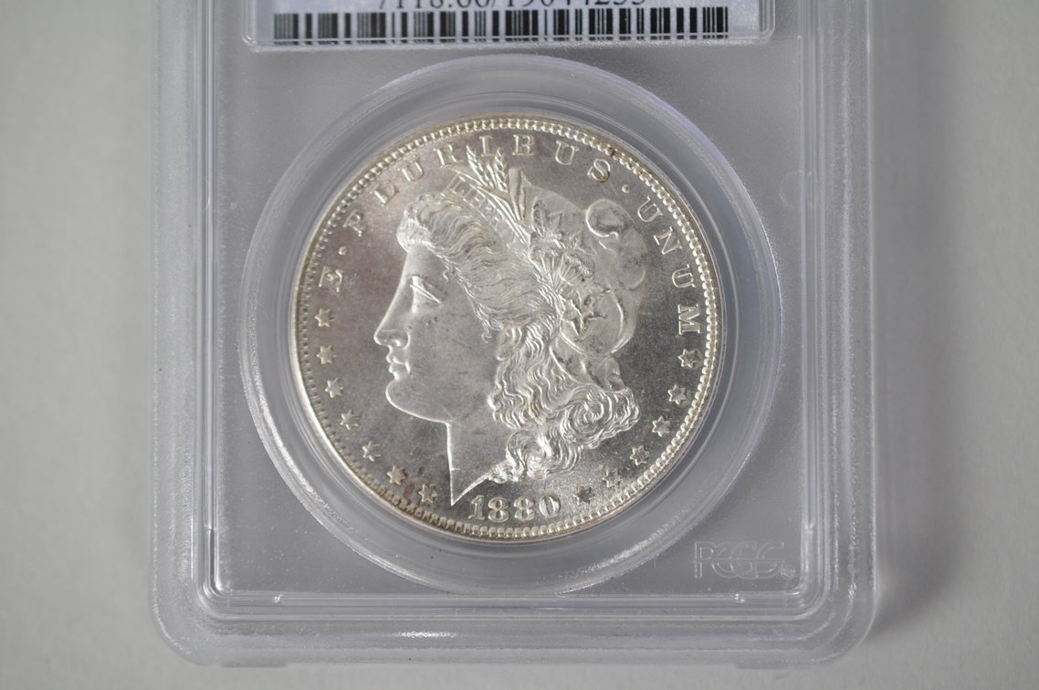 Graded and Slabbed Mint Condition Morgan Silver Dollar, photo 2 of 5