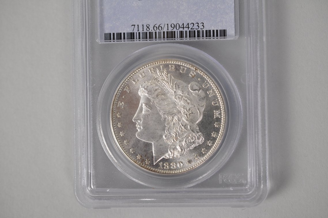 Graded and Slabbed Mint Condition Morgan Silver Dollar, photo 3 of 5