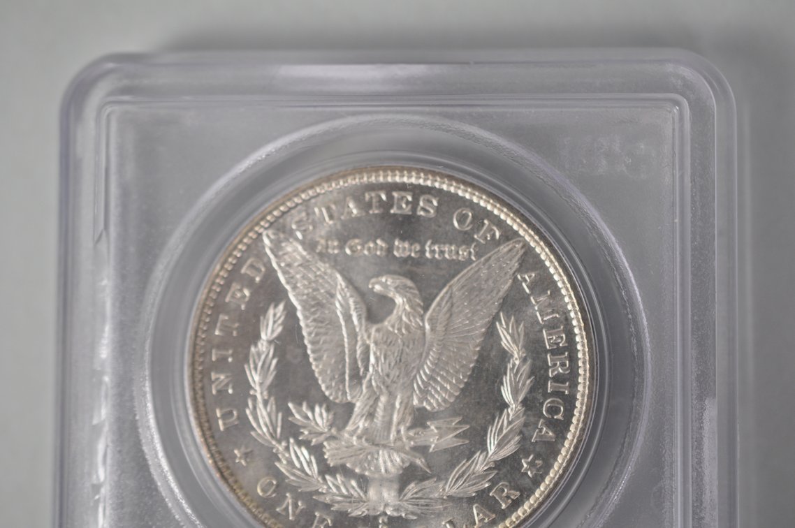 Graded and Slabbed Mint Condition Morgan Silver Dollar, photo 7 of 8