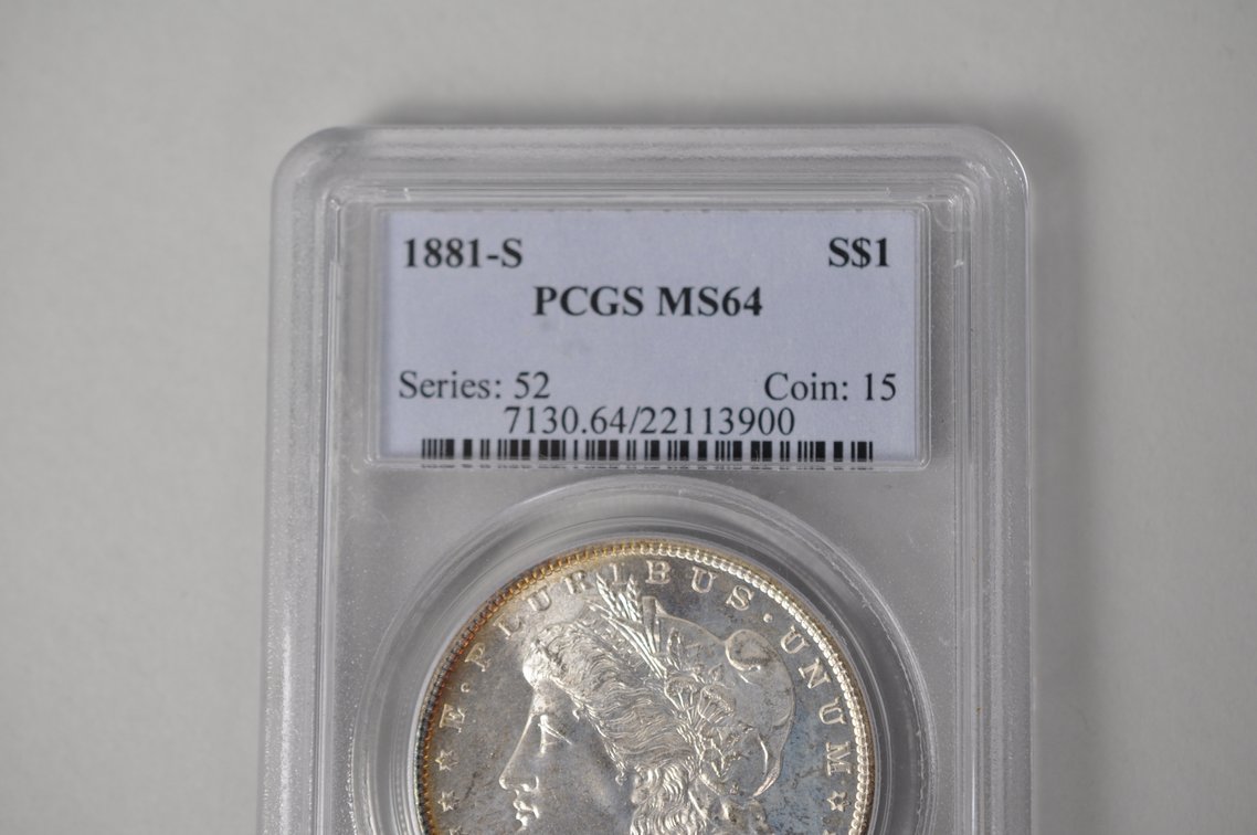 Graded and Slabbed Mint Condition Morgan Silver Dollar, photo 3 of 7