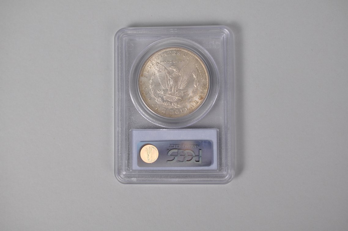 Graded and Slabbed Mint Condition Morgan Silver Dollar, photo 3 of 4