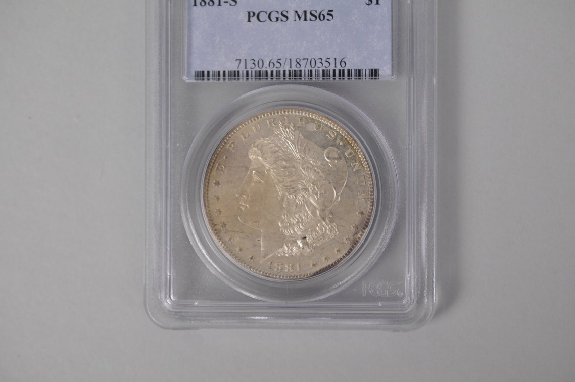 Graded and Slabbed Mint Condition Morgan Silver Dollar, photo 2 of 6