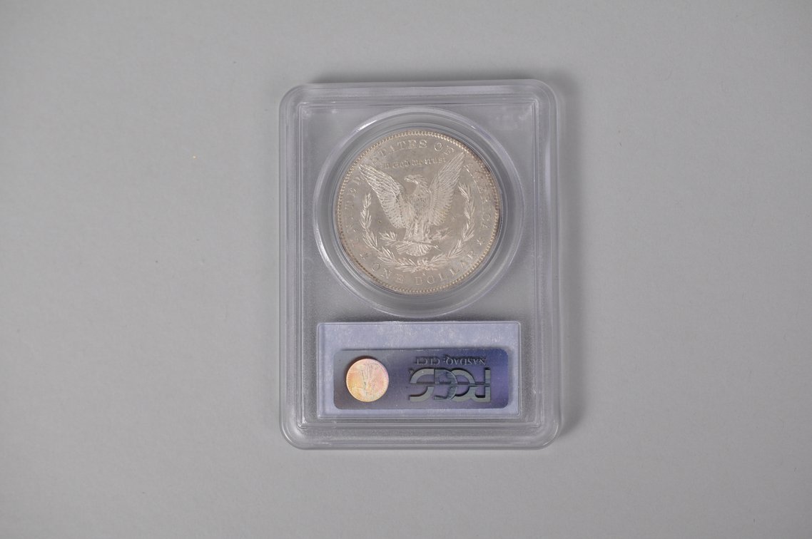 Graded and Slabbed Mint Condition Morgan Silver Dollar, photo 4 of 6