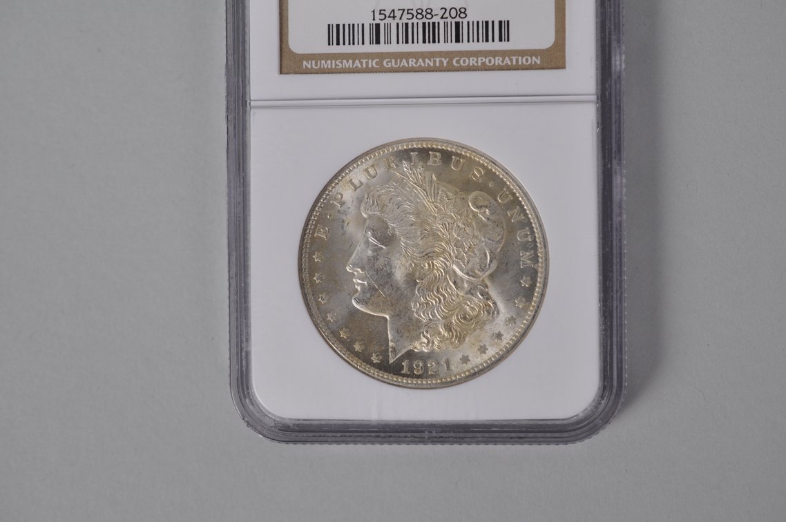 Graded and Slabbed Mint Condition Morgan Silver Dollar, photo 2 of 6