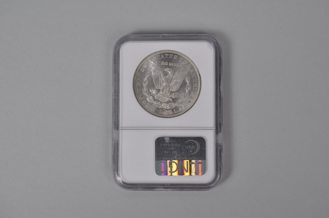 Graded and Slabbed Mint Condition Morgan Silver Dollar, photo 3 of 5