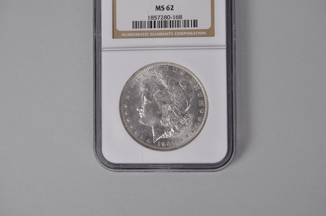 Graded and Slabbed Mint Condition Morgan Silver Dollar, photo 2 of 6