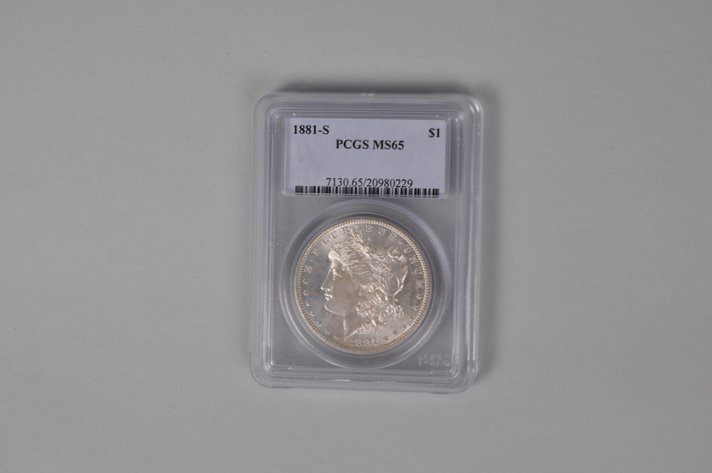 Graded and Slabbed Mint Condition Morgan Silver Dollar