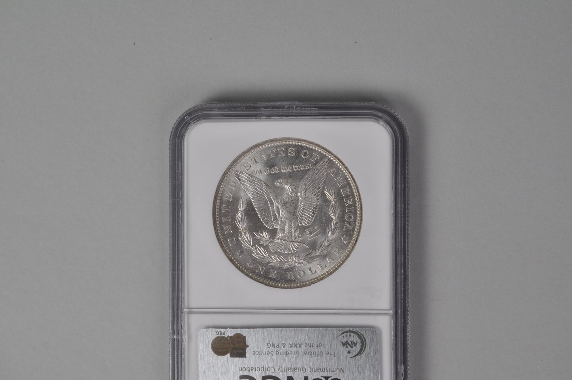 Graded and Slabbed Mint Condition Morgan Silver Dollar, photo 5 of 6