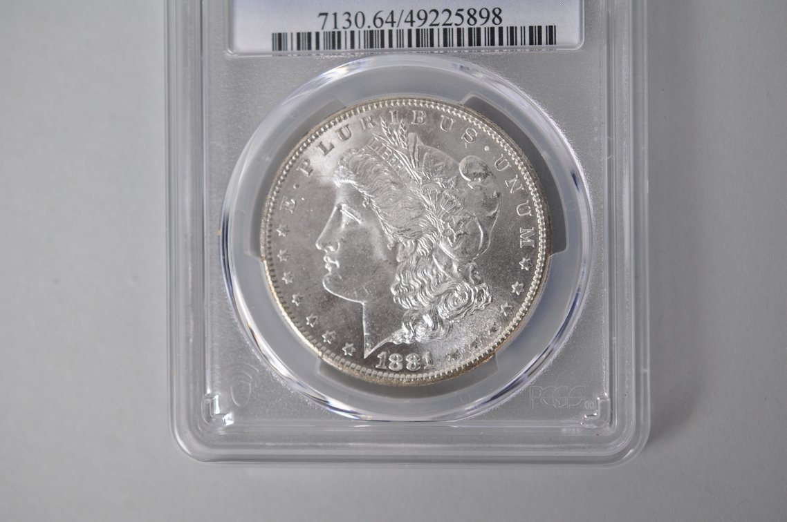 Graded and Slabbed Mint Condition Morgan Silver Dollar, photo 3 of 5