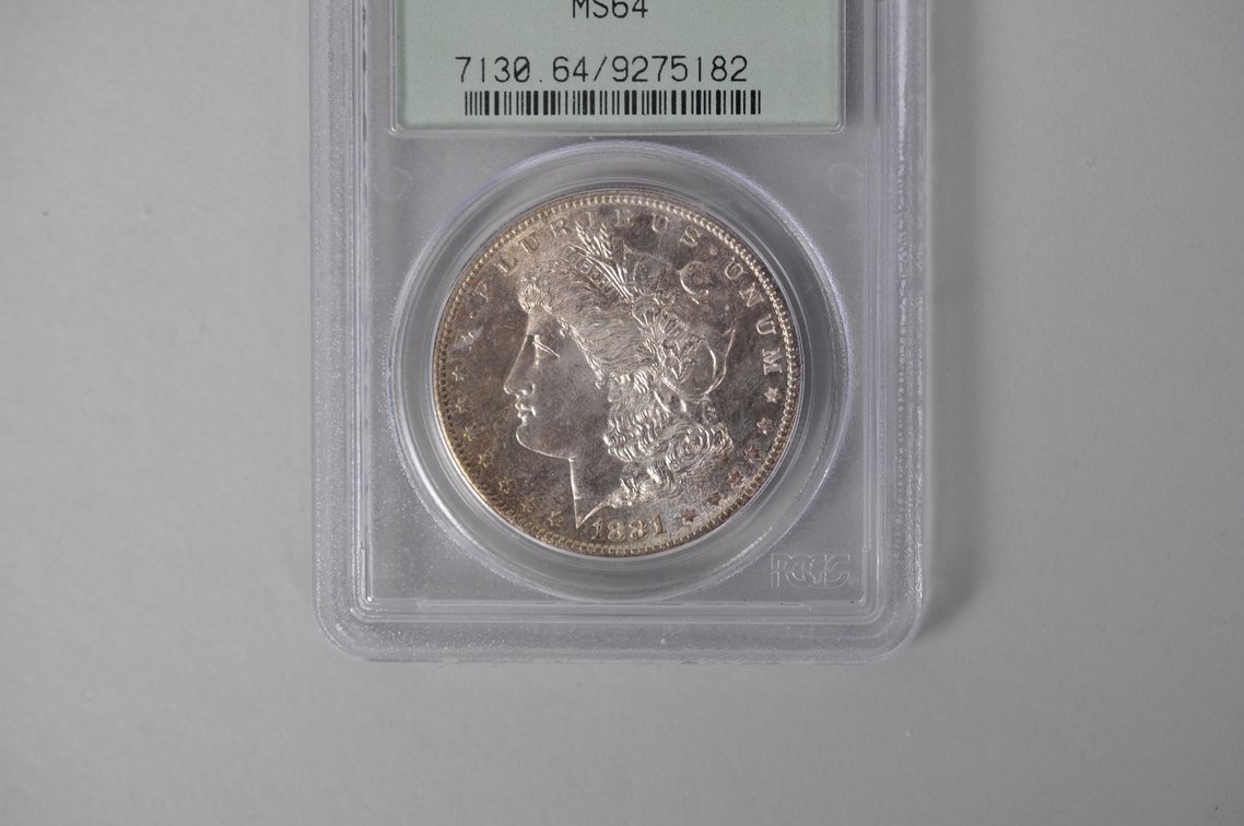 Graded and Slabbed Mint Condition 1881 Morgan Silver Dollar, photo 2 of 5