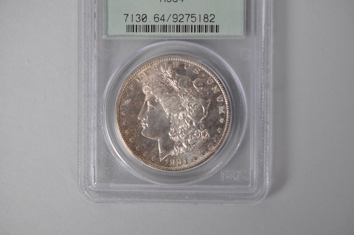 Graded and Slabbed Mint Condition 1881 Morgan Silver Dollar, photo 3 of 5