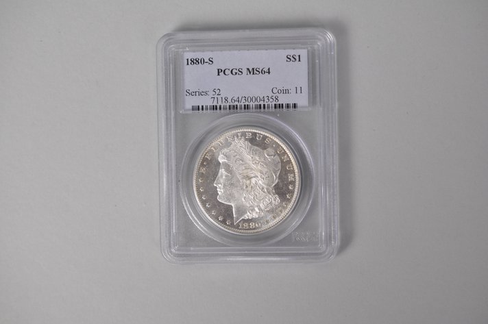 Graded and Slabbed 1880 Mint Condition Morgan Silver Dollar