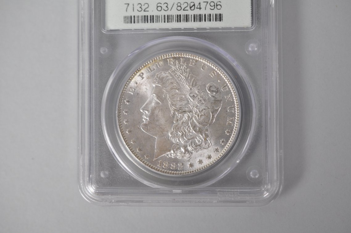 Graded and Slabbed Mint Condition 1882 Morgan Silver Dollar, photo 3 of 6
