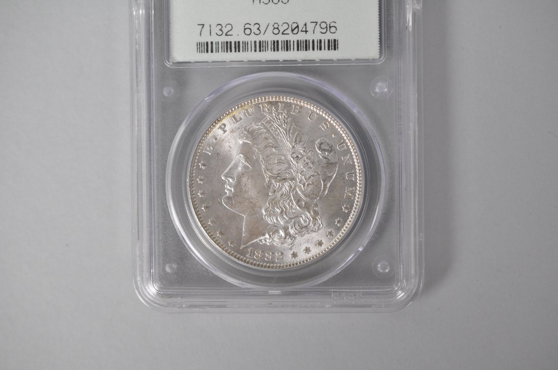 Graded and Slabbed Mint Condition 1882 Morgan Silver Dollar, photo 2 of 6