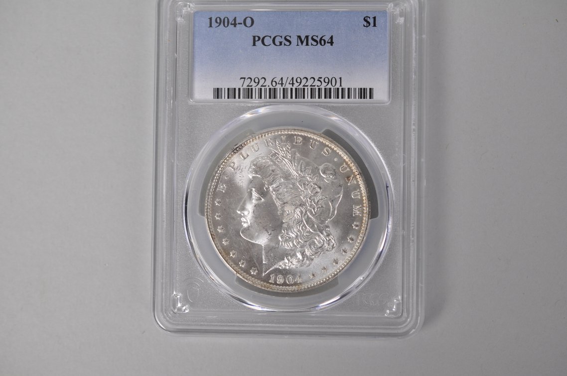 Graded and Slabbed Mint Condition Morgan Silver Dollar, photo 2 of 6