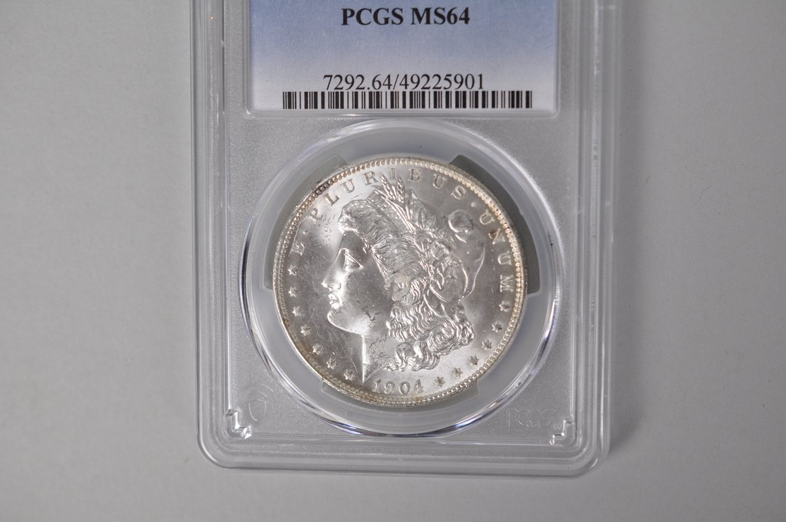 Graded and Slabbed Mint Condition Morgan Silver Dollar, photo 3 of 6