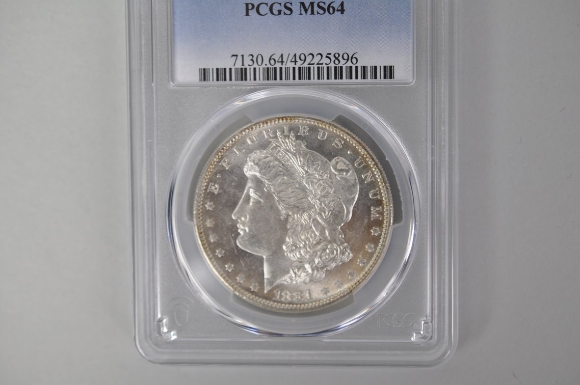 Graded and Slabbed Mint Condition Morgan Silver Dollars, photo 9 of 13